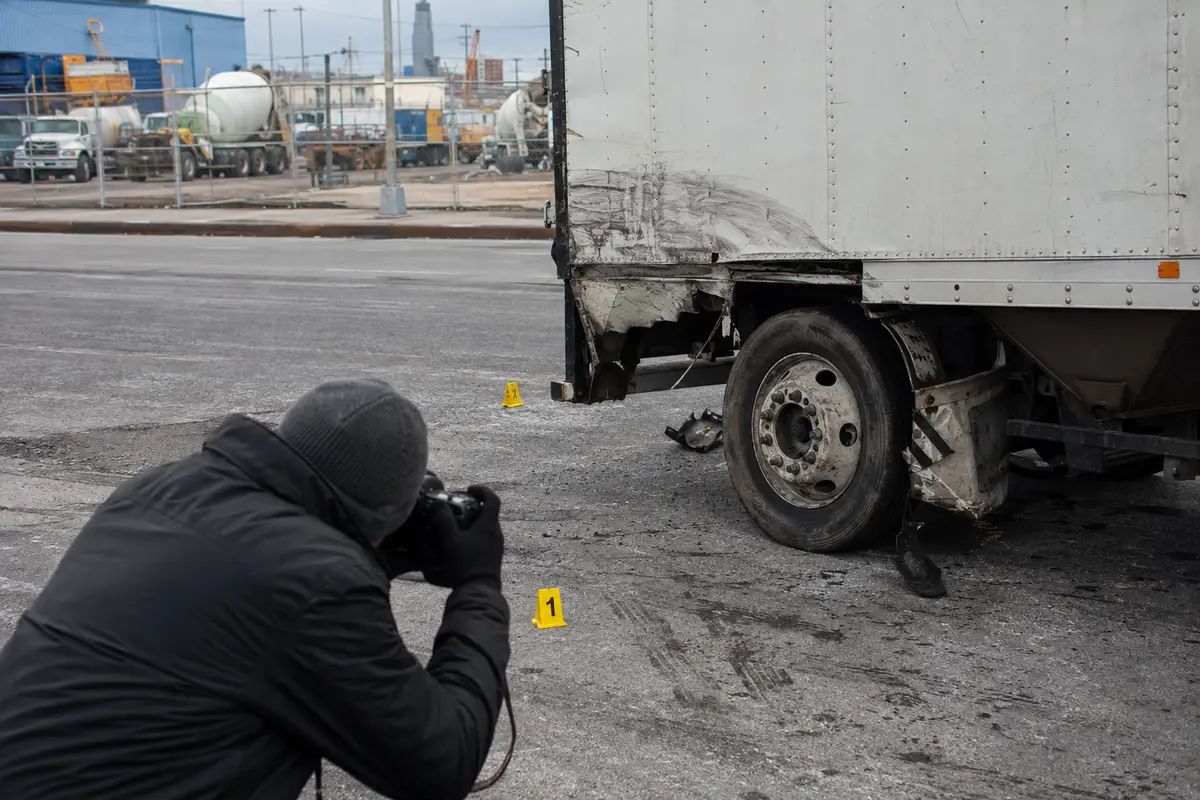 Truck Accident attorney investigating evidence in Queens, NY